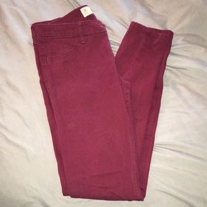 Burgundy super skinny jeans